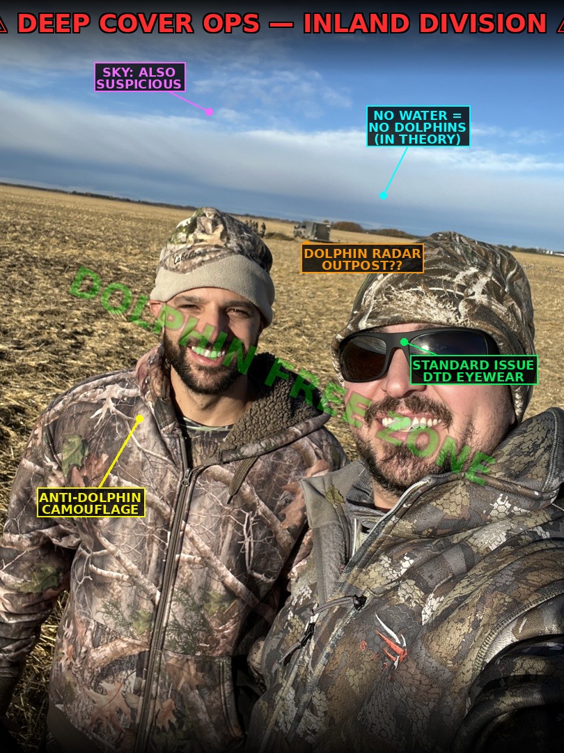 DTD agents in anti-dolphin camouflage in a field